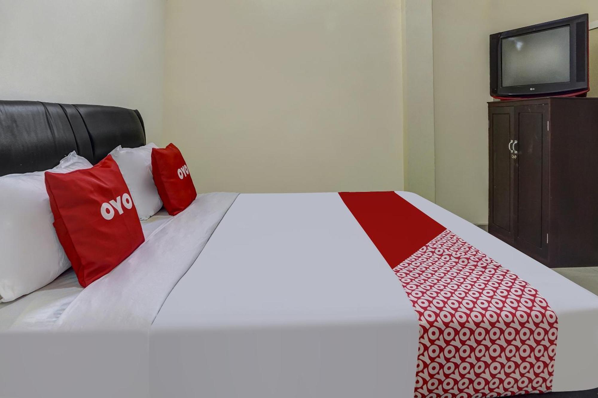 Oyo 91084 오케 게스트 하우스 말랑 외부 사진